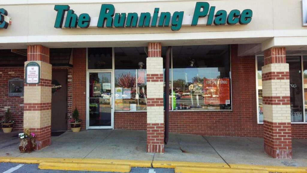 Photo of the exterior of the old The Running Place store in the Newtown Square Shopping Mall.